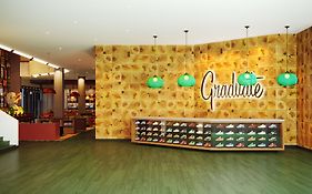 Graduate By Hilton Eugene